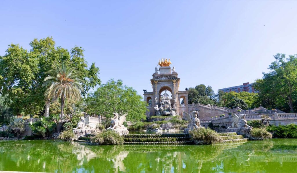 A historic fountain in sunny Barcelona, Spain on a bright summer day